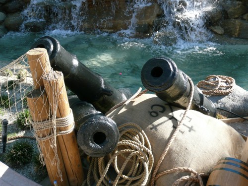pirate props, cannons, barrels